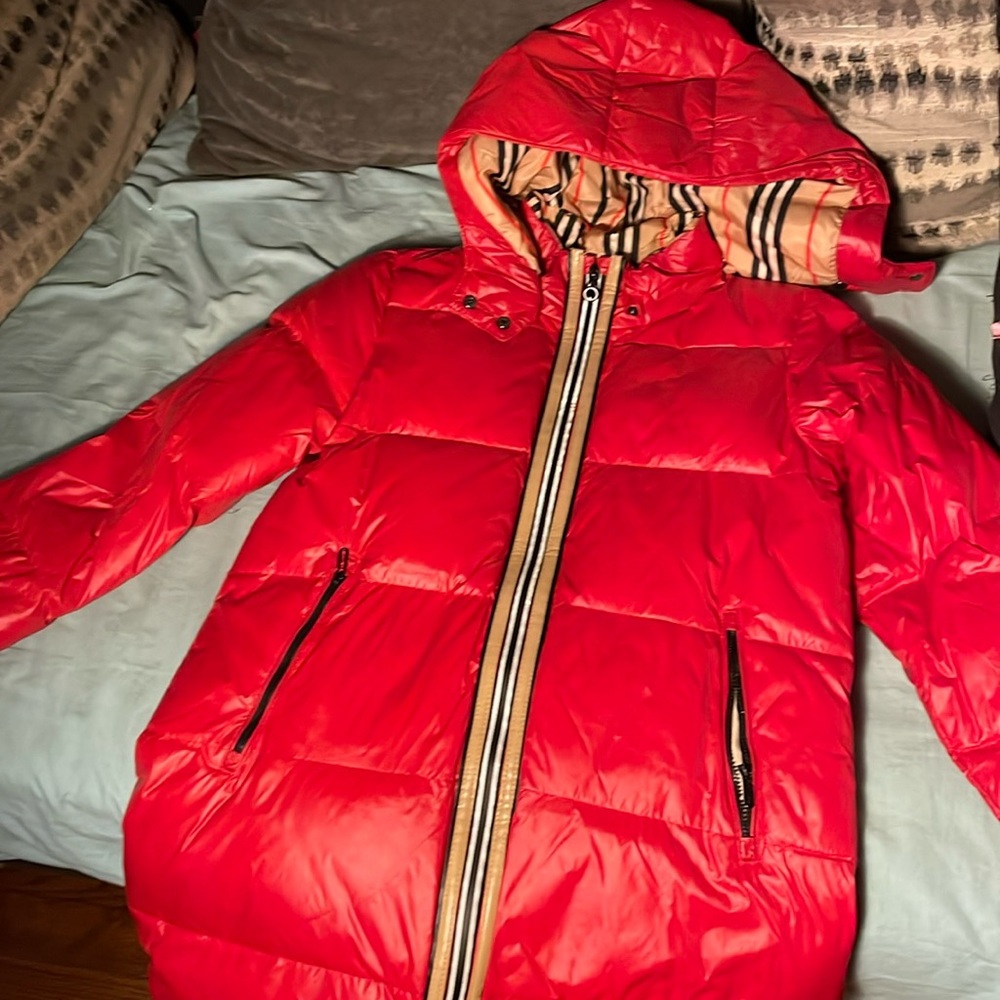 Burbury coat slightly worn Good condition .